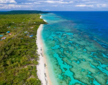 Paysage de Lifou Paysage Lifou Vue aérienne Plage mer Coraux Village